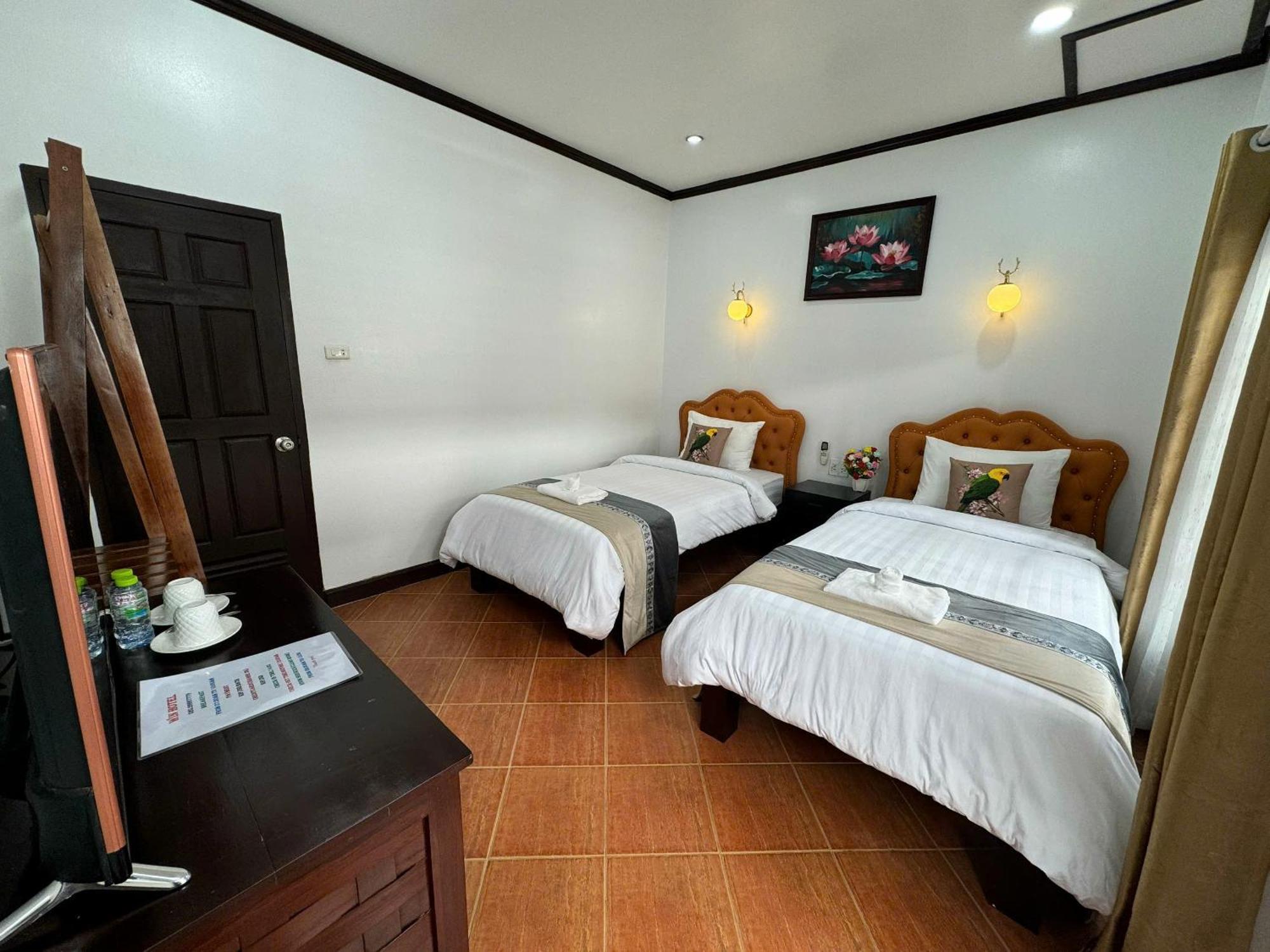 Win Hotel Vang Vieng Habitación foto